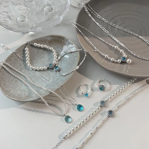 S925 silver pearl jewelry set featuring light blue aquamarine stones and beads