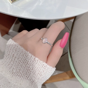 French style 925 silver ring with oval chalcedony gemstone worn by a model