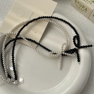 S925 sterling silver bow necklace with double-layered black and white beads for women
