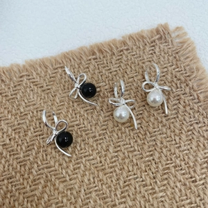 Elegant S925 sterling silver bow earrings with black agate and white pearl beads