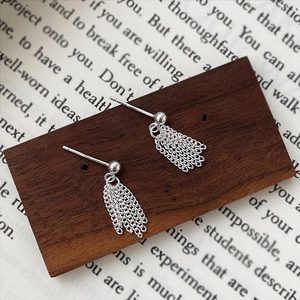 Elegant S925 sterling silver long tassel chain drop earrings on wooden surface