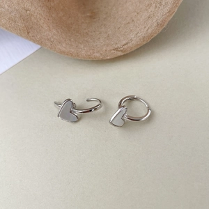 Detail of S925 silver heart earrings with white mother of pearl inlay and hinge mechanism
