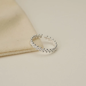 Detailed close-up of S925 sterling silver layered bubble bead ring with adjustable open band