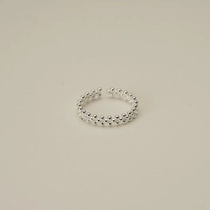 Detail of multi-layer silver beads on an adjustable minimalist S925 sterling silver ring