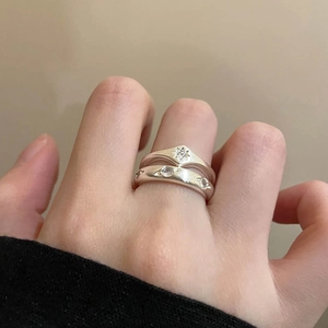 Elegant S925 sterling silver matte star ring set with zircon stones on finger