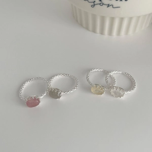 Set of four S925 silver open rings with colorful oval crystal gemstones in a minimalist style