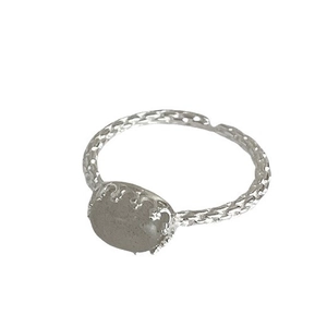 Vintage S925 silver open ring with textured band and oval crystal stone on white background
