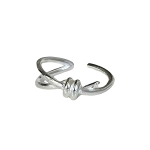 Minimalist S925 sterling silver ring featuring a unique twisted knot design on white background