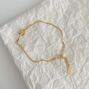 Elegant gold S925 sterling silver knotted braided bracelet with adjustable chain link