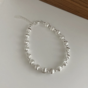 Minimalist S925 sterling silver beaded bracelet with brushed and polished metal finishes