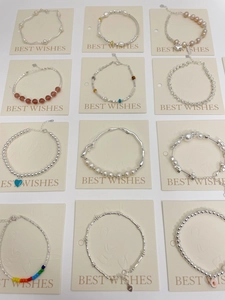 Collection of S925 sterling silver bracelets with natural pearls and red agate details