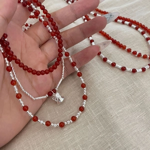 S925 sterling silver multilayer necklace with red agate beads and bow bell pendant