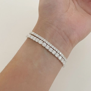 Close-up of minimalist S925 sterling silver tennis bracelets with sparkling zircons