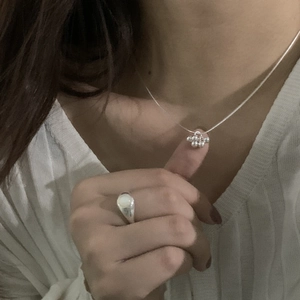 Close-up of S925 sterling silver bead cluster pendant with invisible nylon cord necklace