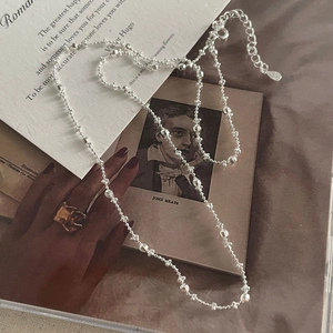 Minimalist S925 sterling silver beaded necklace with geometric charms for daily wear