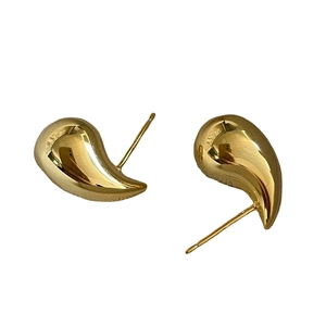 Polished 925 sterling silver golden teardrop earrings with a minimalist sleek organic design