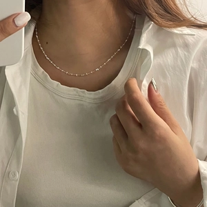 Minimalist S925 sterling silver beaded necklace shown on model for daily casual wear style