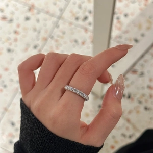 Sparkling S925 sterling silver eternity ring with three-sided pave cubic zirconia inlay