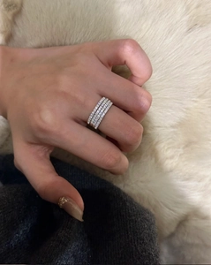 Detailed close-up of 925 sterling silver eternity rings with shimmering zircon stones