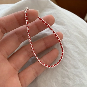 Minimalist S925 sterling silver red braided rope bracelet with silver beads on hand
