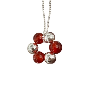 Elegant S925 sterling silver necklace with red bead flower pendant on white background