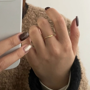Minimalist S925 sterling silver golden fish ring with sparkling zircon on model hand