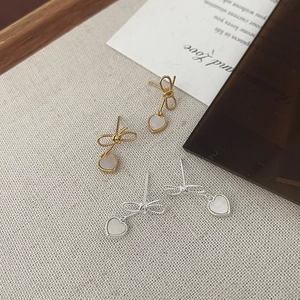 Boucles d'oreilles nœud papillon et cœur en argent S925 coloris doré et argenté