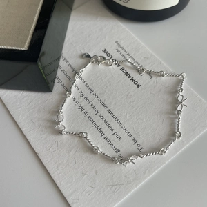 Bracelet fait main en argent S925 avec nœuds papillon et chaîne torsadée élégante