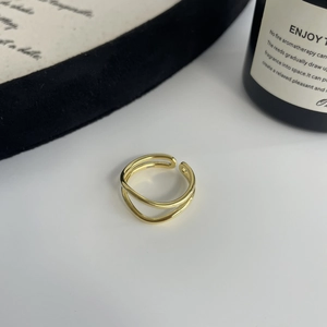 Close-up of S925 sterling silver hallmark on an elegant double-layer gold-plated open ring