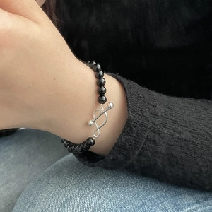Minimalist S925 sterling silver black onyx beaded bracelet with toggle clasp worn on wrist