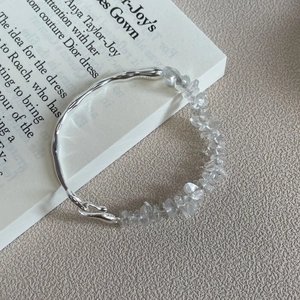 Macro shot of 925 sterling silver bracelet with crystal stone and S925 engraved stamp