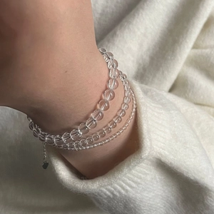 Three-layer S925 sterling silver beaded bracelet with clear white crystals on knit sleeve