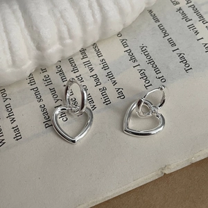 925 sterling silver double hoop earrings with hollow heart charms on vintage book page