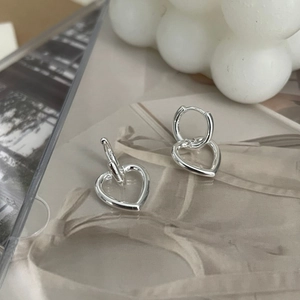 Minimalist S925 sterling silver double-hoop earrings featuring polished heart-shaped pendants