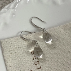 Detail of S925 sterling silver drop earrings with clear crystal waterdrop pendants