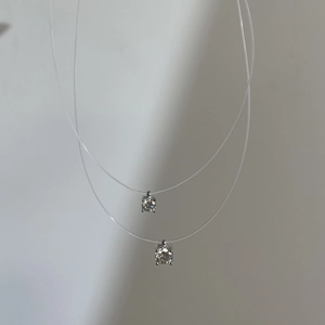Minimalistische S925 Silber Halskette mit unsichtbarem Nylonfaden und Zirkon-Anhänger