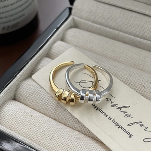 Detail of S925 sterling silver hallmarked inner band on minimalist open-style ring