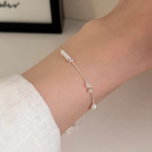 Minimalist S925 sterling silver beaded bracelet on wrist with elegant Chopin chain link