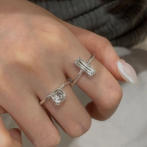 Detail of S925 sterling silver square and rectangular geometric rings with zircon stones