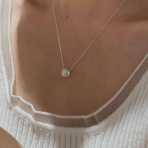Minimalist S925 sterling silver star zircon necklace shown on female collarbone