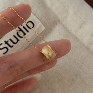 Elegant gold plated S925 silver cylinder necklace with brushed star pattern and zircons