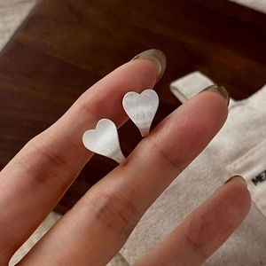 Minimalist S925 sterling silver heart-shaped stud earrings with brushed matte finish