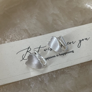 Minimalist S925 sterling silver heart studs with a brushed matte finish for women
