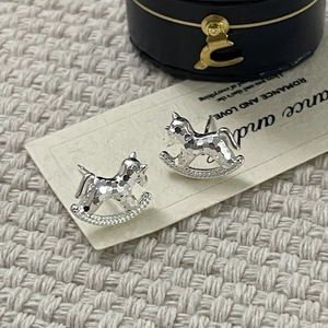 Elegant S925 sterling silver rocking horse stud earrings with hammered finish on white card