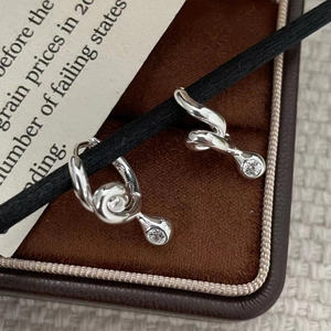 Minimalist S925 sterling silver twisted hoop earrings with sparkling round zircon stones
