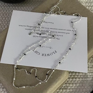 Elegant S925 sterling silver ball necklace with black and white beads on thin chain