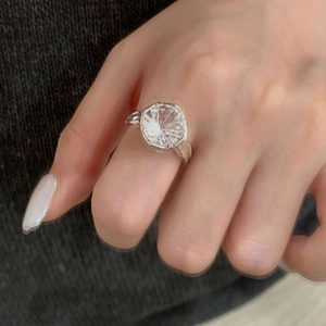 Vintage S925 silver ring featuring a large octagonal fireworks cut white zircon on hand