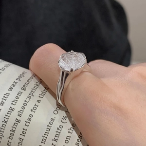 Detailed view of S925 silver ring featuring a large hexagonal white zircon on a hand