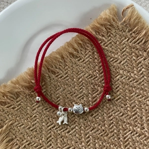Adjustable red woven cord bracelet with S925 silver cat and small fish charms