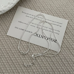 Detail of S925 sterling silver snake chain necklace with lobster clasp and extender